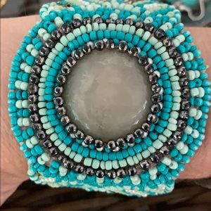 Turquoise beaded bracelet with large stone center